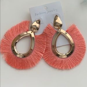 Peach statement earrings